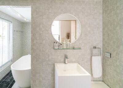 Modern bathroom with bathtub and sink