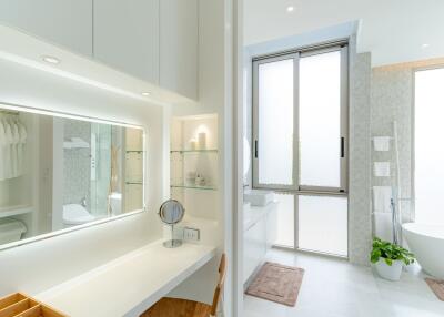 Modern bathroom with vanity and bathtub