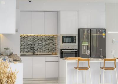 Modern kitchen with island and bar stools