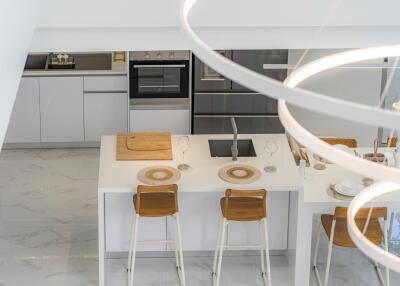 Modern kitchen with island counter and stools