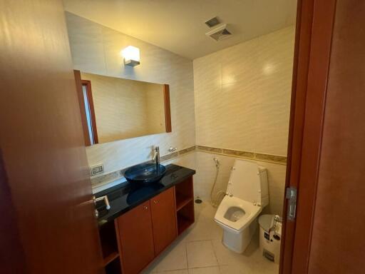 Bathroom with sink and toilet