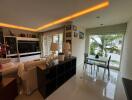 Modern living room with large windows and natural light