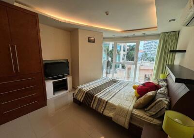 Bedroom with modern design featuring a large window