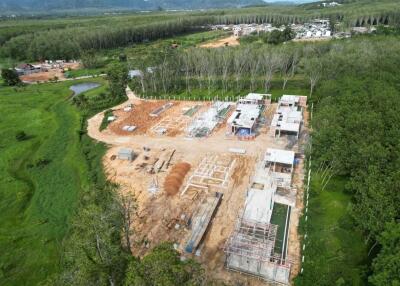 Photo of a construction site with ongoing building activities