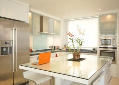 Modern kitchen with stainless steel appliances and island