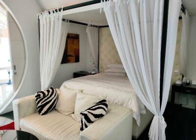 Elegant bedroom with canopy bed and stylish decor