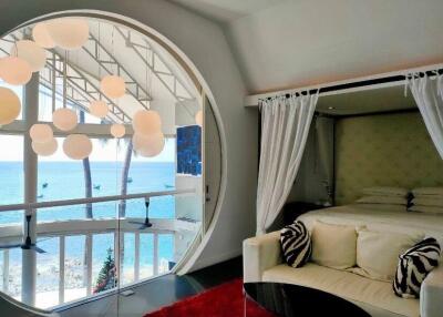 Luxurious bedroom with ocean view and modern decor