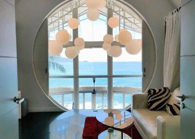 Living room with ocean view and modern furniture