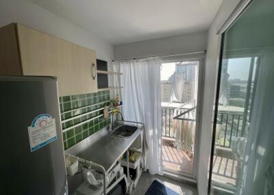 Bright kitchen with balcony view