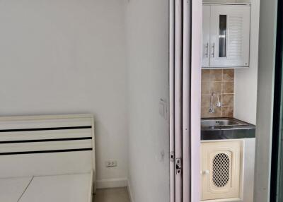 Small studio with kitchenette and bed