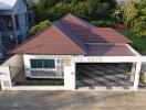 Front view of a house with a brown roof