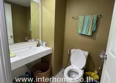 Modern bathroom with toilet and sink