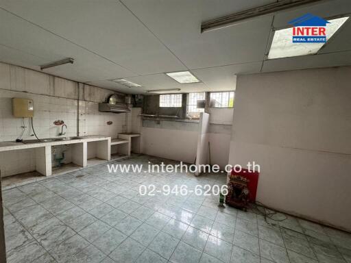 Basic kitchen with tiled floor and countertops