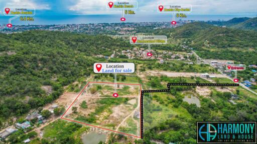 Aerial view of property land for sale with landmarks and distances indicated