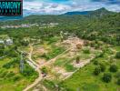 Aerial view of undeveloped land with hills and trees