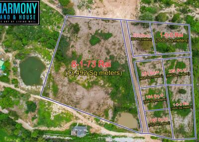 Aerial view of land plots with measurements