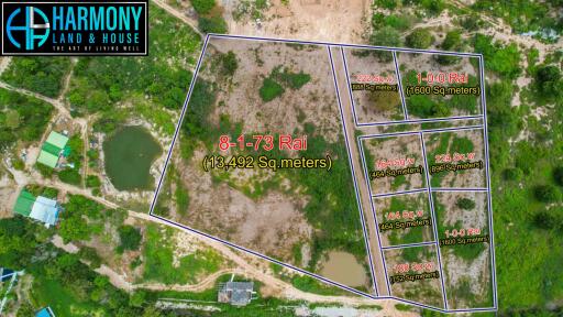 Aerial view of land plots with measurements