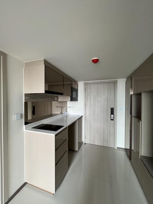 Modern kitchen with sleek cabinetry and integrated appliances