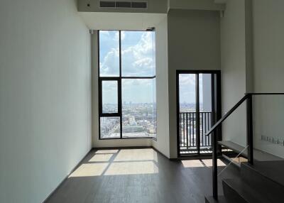 modern living room with large windows and city view