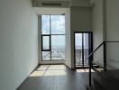 modern living room with large windows and city view