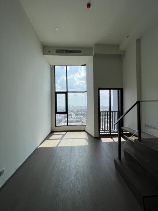 modern living room with large windows and city view