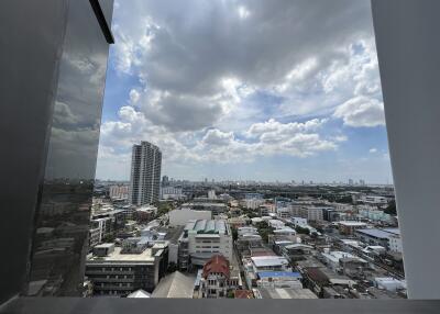 View of cityscape from apartment balcony