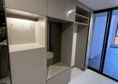 Modern bedroom wardrobe with shelves and storage compartments