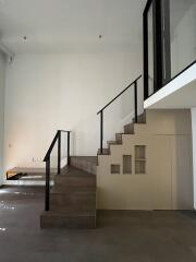 Modern living area with a staircase