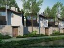 Modern townhouses with greenery and water