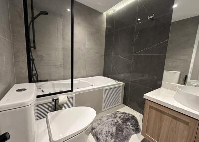 Modern bathroom with bathtub and shower