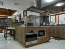 Modern kitchen with wooden cabinetry and stainless steel appliances