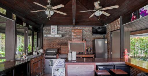 Rustic kitchen with modern appliances and wooden interiors