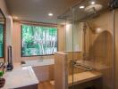 Modern bathroom with large window, bathtub, and shower