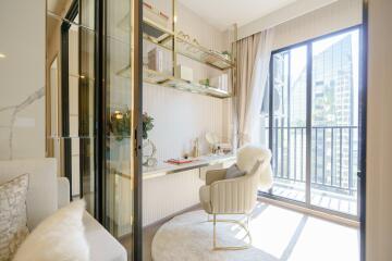 Bright home office with a desk and large windows