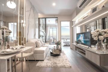 Modern living room with elegant furnishings and a view of the city