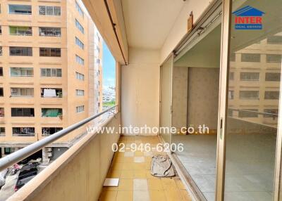 Balcony view with tiled floor and glass door