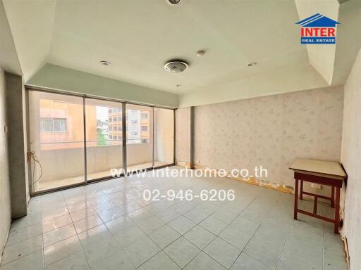 Spacious living room with balcony access