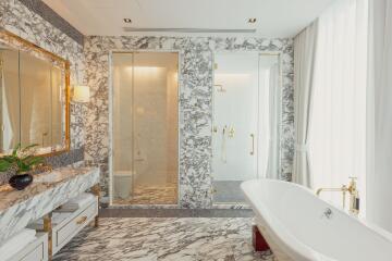 Luxurious bathroom with marble finishes and modern fixtures