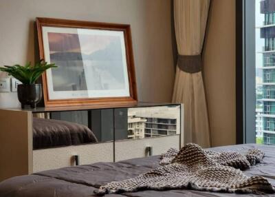 Contemporary bedroom with a view of skyscrapers