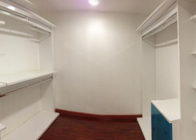 Spacious walk-in closet with ample storage