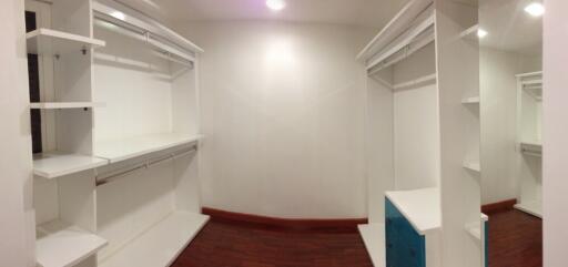 Spacious walk-in closet with ample storage