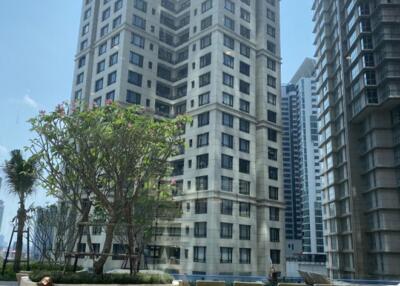 View of tall residential buildings with a landscaped outdoor area