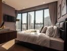 Modern bedroom with large windows and city view