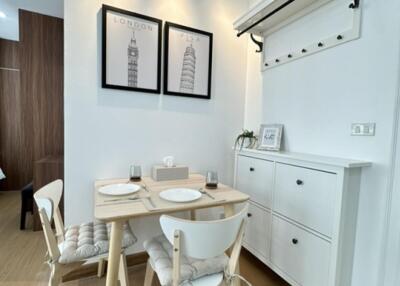 Compact dining area with wooden furniture