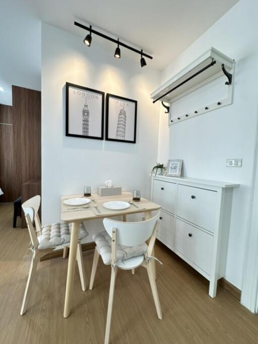 Compact dining area with wooden furniture