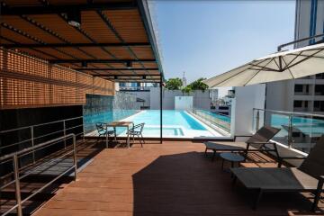 Swimming pool with lounging area