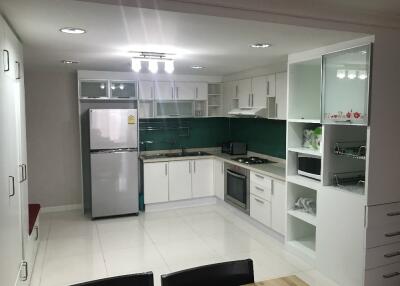 Modern white kitchen with appliances