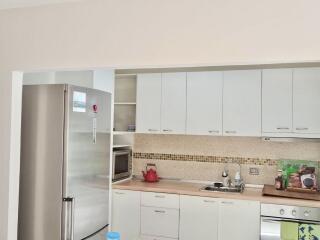 Modern kitchen with stainless steel appliances