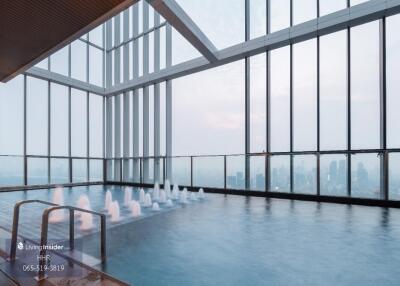 Indoor infinity pool with city view