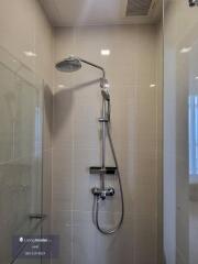 Shower area with modern fixtures